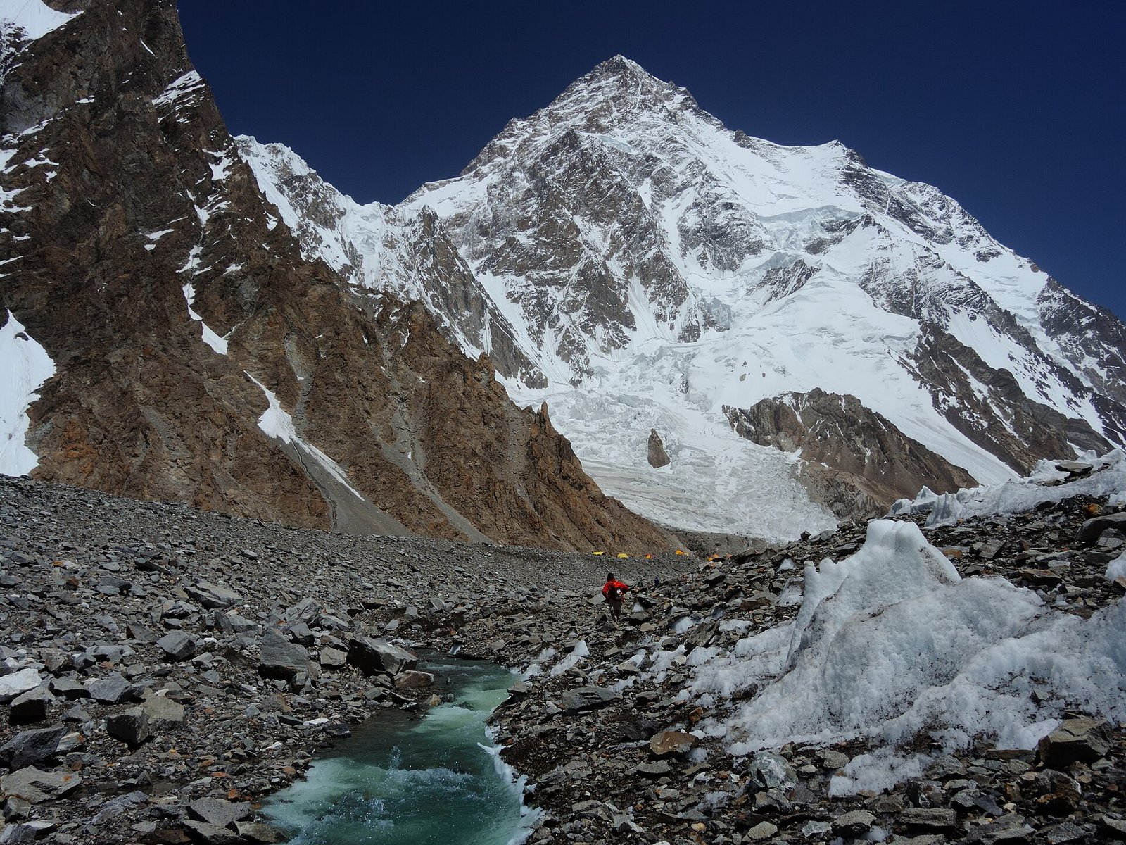 Trekkers approaching K2 base camp at the end of the Baltoro Glacier