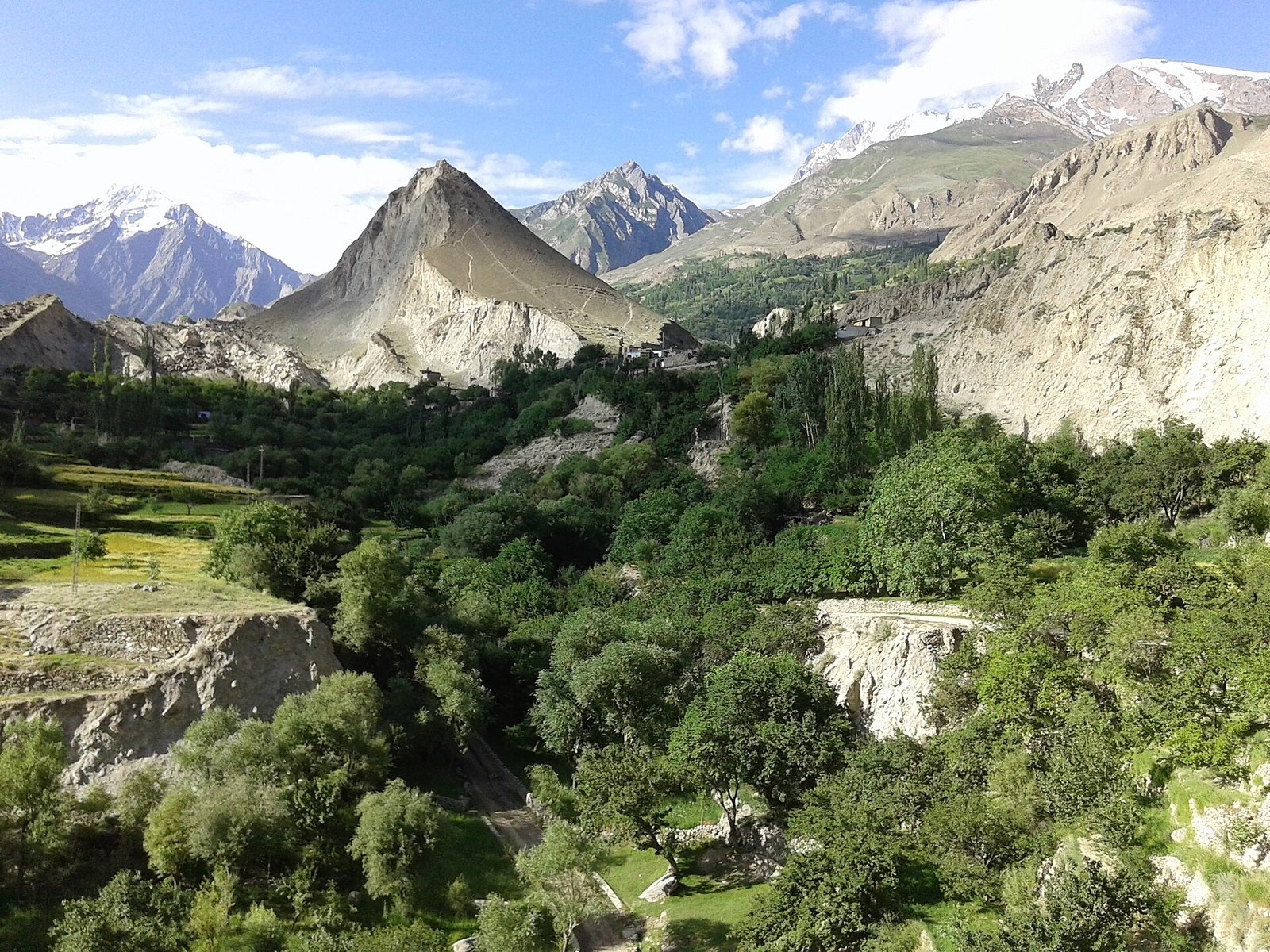 Nagar Valley: green fields and villages of Nagar Proper below the Karakoram peaks
