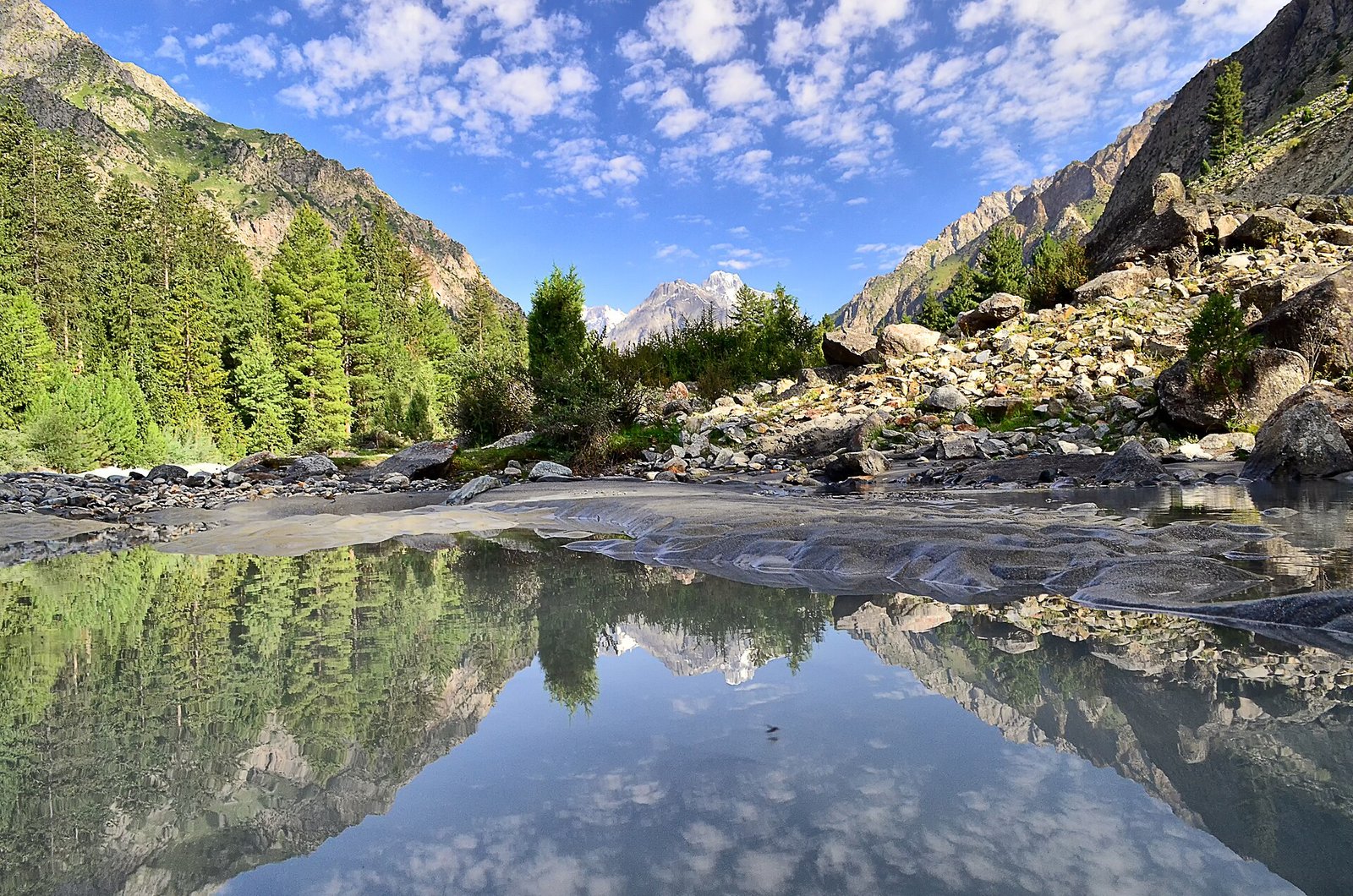 Naltar Valley: mountains reflected in still water