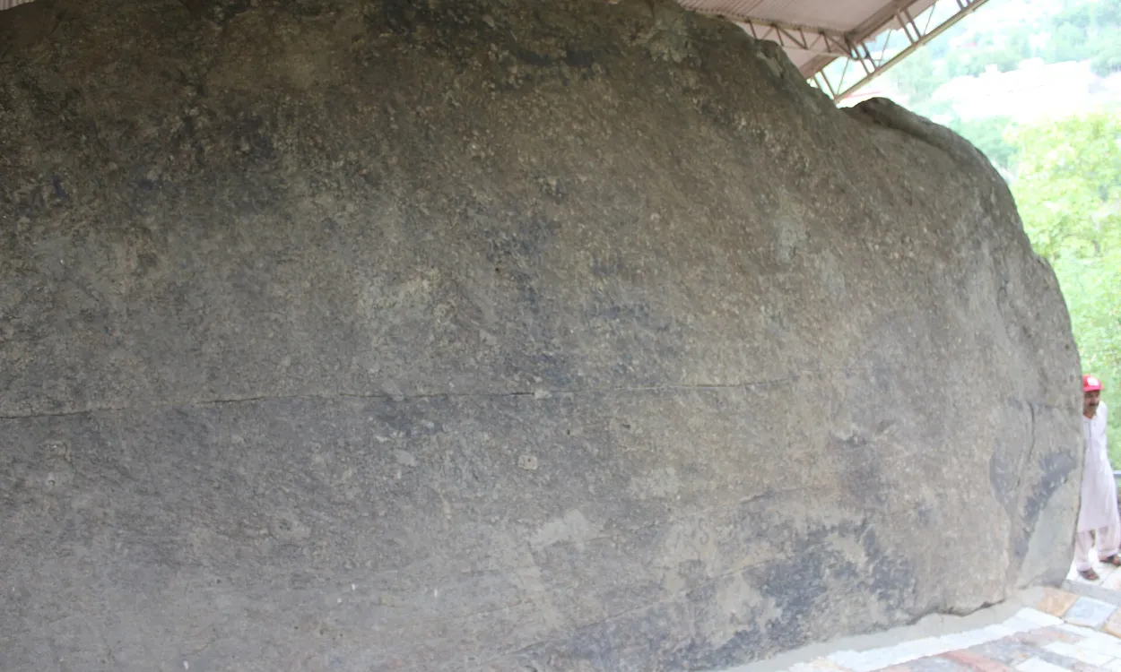 The inscribed boulder of the Ashoka rock edicts at Shahbaz Garhi, Mardan, Pakistan