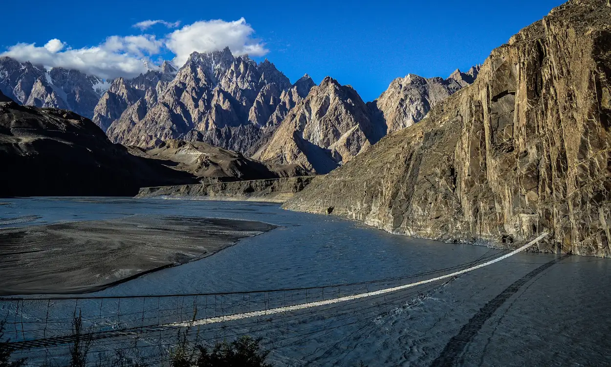 The Hussaini suspension bridge below the Passu Cones in Upper Hunza, Pakistan