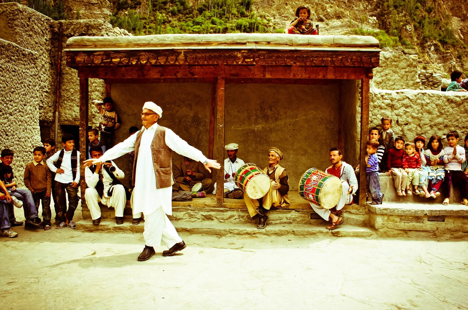 Local musicians and dancers celebrating a festival at Altit Fort, Hunza, Pakistan