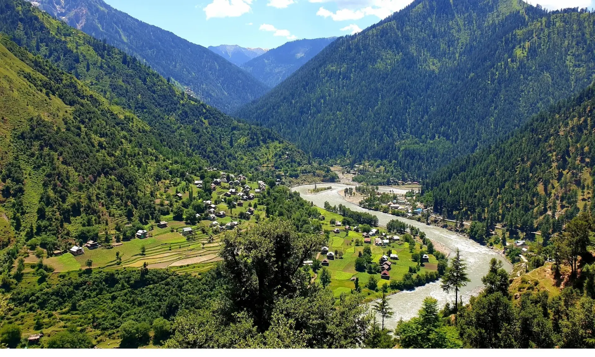 Green forested slopes and the Neelum River in Neelum Valley, Azad Kashmir