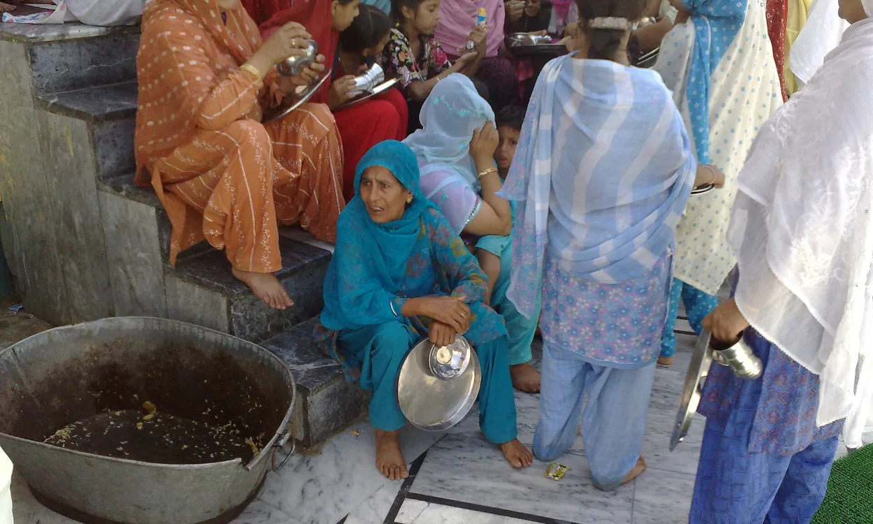 Sikh pilgrims preparing langar at Gurdwara Panja Sahib, Hasan Abdal, Pakistan