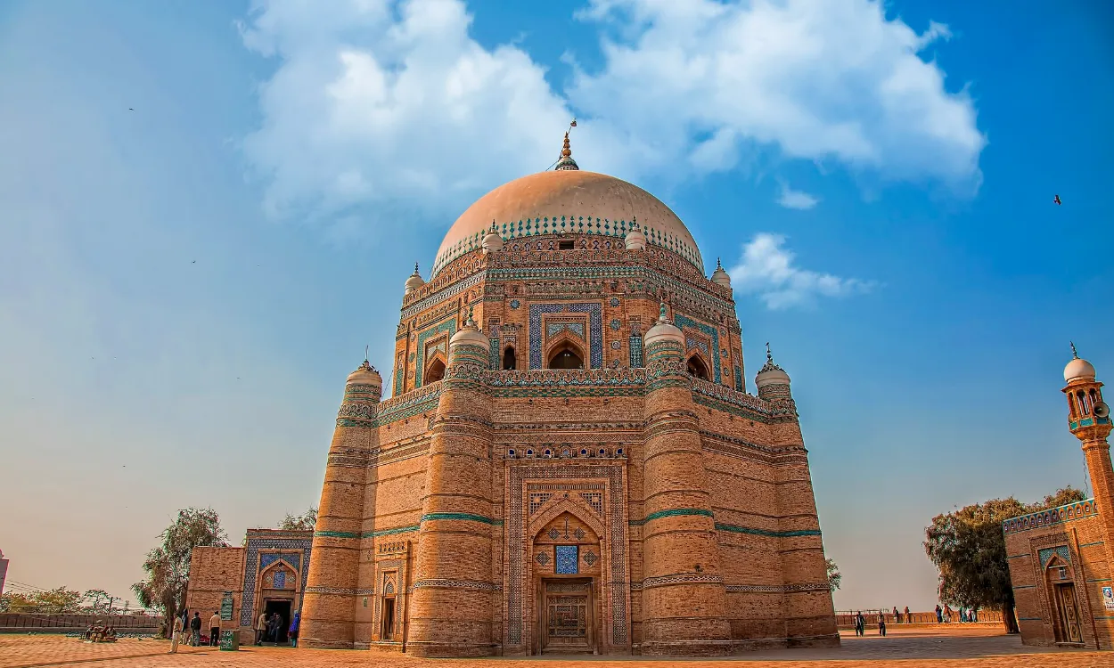 The tomb of Shah Rukn-e-Alam under a blue sky in Multan, Punjab, Pakistan